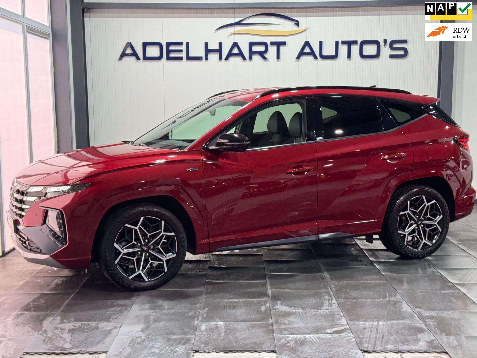 Hyundai Tucson 1.6 T-GDI MHEV N Line / Navigatie full map / Camera / Cruise control / full option 44215797-0.jpg | Adelhart Auto's