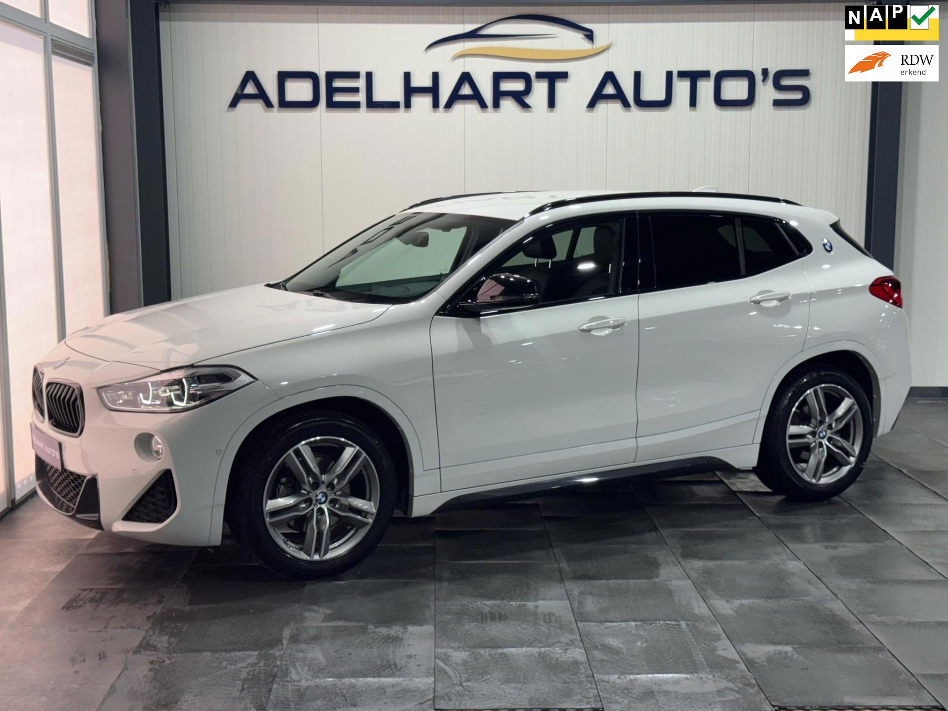 BMW X2 SDrive18i Executive M Sport / Automaat / Navigatie full map / Cruise control / Climate control / etc.. 49013399-0.jpg | Adelhart Auto's