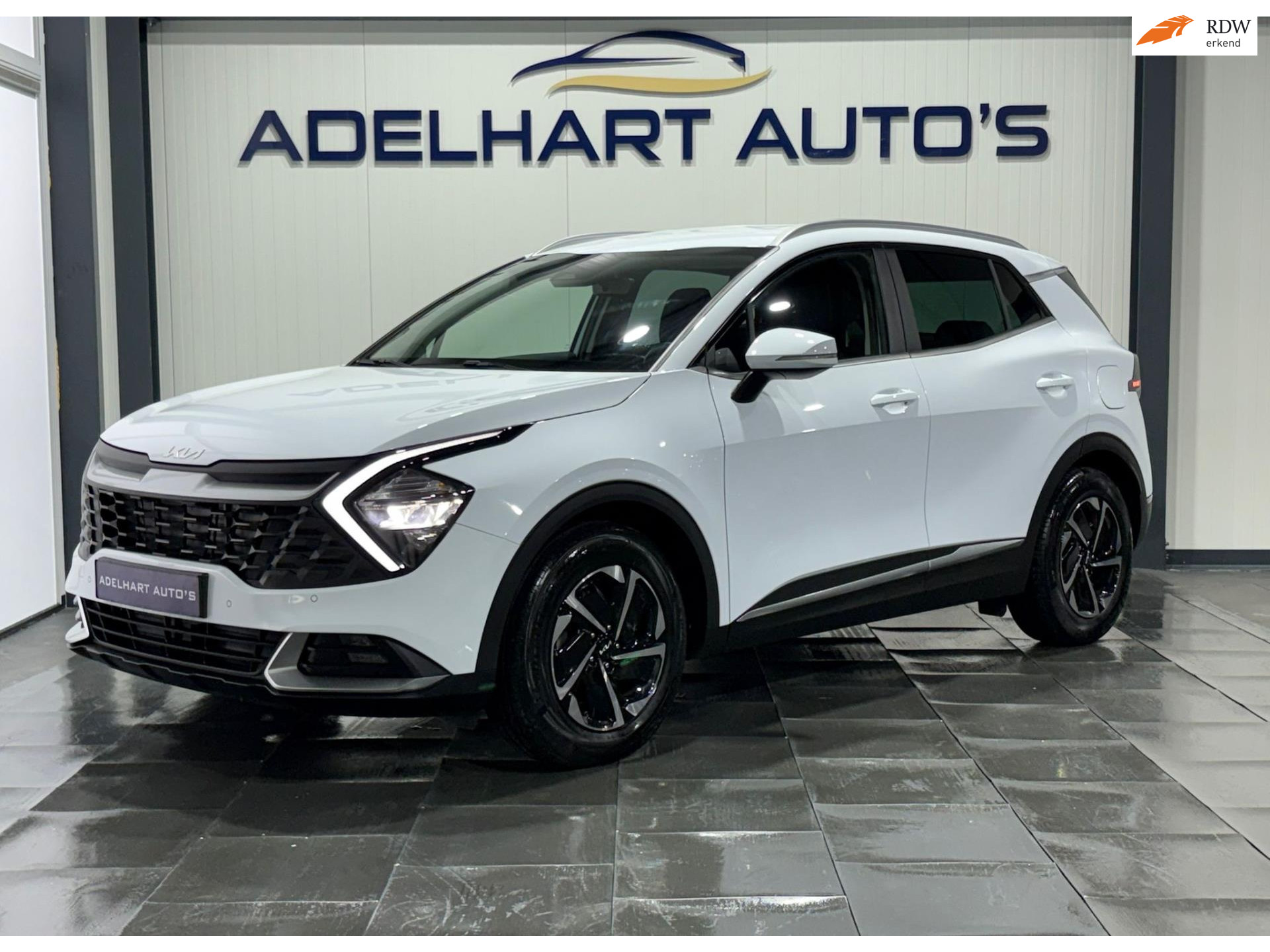 Kia Sportage 1.6 T-GDi MHEV DynamicLine Automaat / Navigatie full map / Camera / Elektrische stoelen / Keyless / etc.. 49534676-0.jpg | Adelhart Auto's