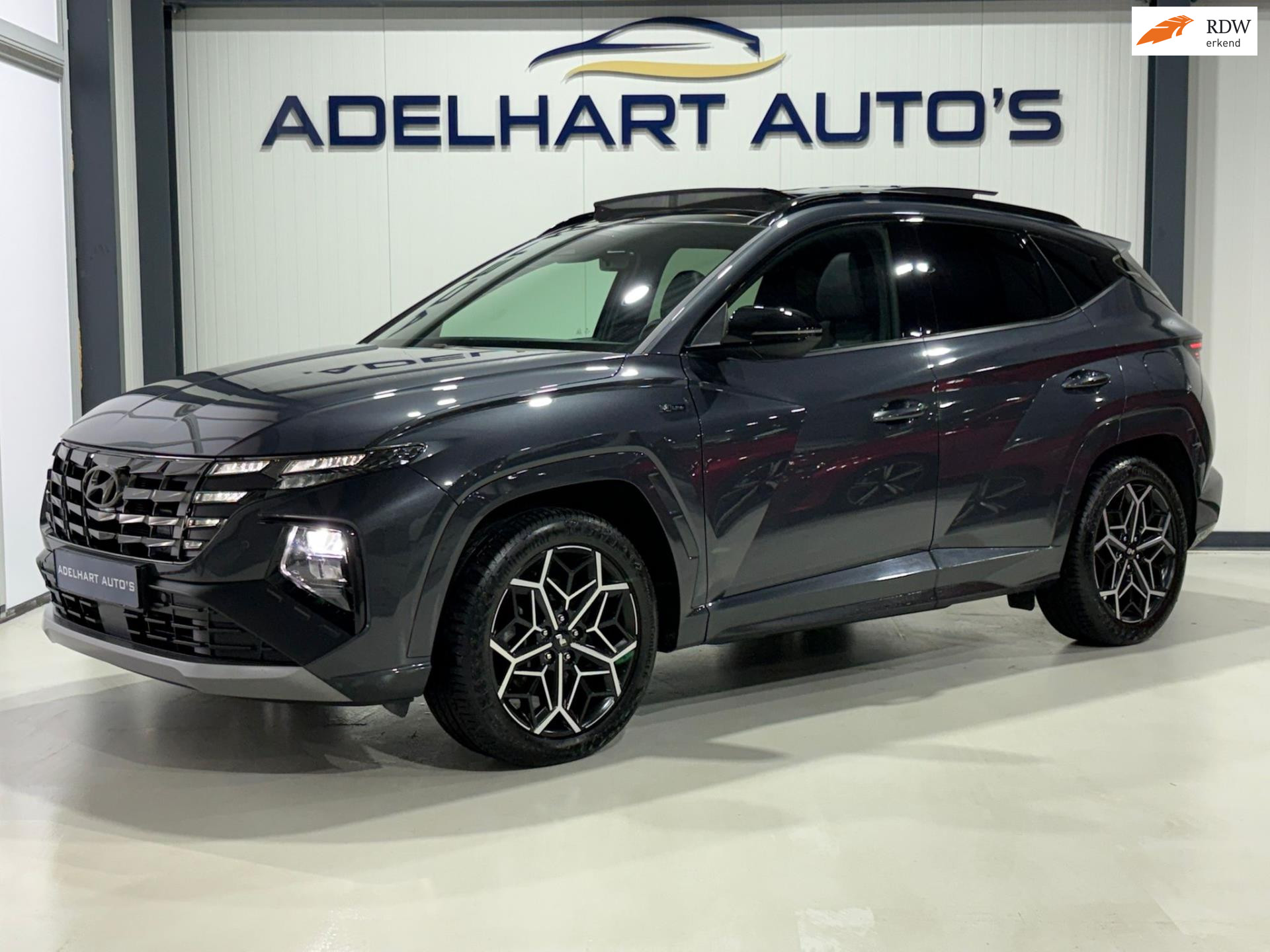 Hyundai Tucson 1.6 T-GDI PHEV N Line 4WD Panoramadak / Full map navigatie / Cruise control / Climate control 50299844-0.jpg | Adelhart Auto's