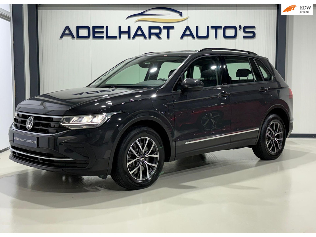 Volkswagen Tiguan 1.4 TSI eHybrid Business+ 245 PK Automaat / Navigatie full Map / Cruise control / Climate Control / Parkeer 50392766-0.jpg | Adelhart Auto's