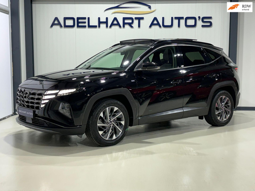 Hyundai Tucson 1.6 T-GDI MHEV Comfort / Panorama dak / Navigatie full map / Camera / Cruise control / Keyless / etc.. 50690735-0.jpg | Adelhart Auto's