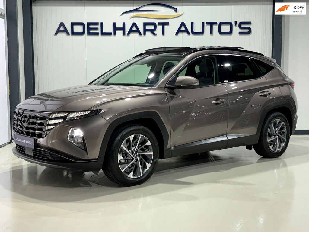 Hyundai Tucson 1.6 T-GDI MHEV Comfort 4 wheel drive H track Automaat / Panorama dak / Navigatie full map / Camera / Cruise control 51461580-0.jpg | Adelhart Auto's