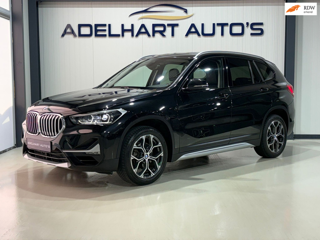 BMW X1 SDrive18i Executive Sport Line / Navigatie full map / Cruise control / Lederen interieur / Climate control / etc.. 51702089-0.jpg | Adelhart Auto's