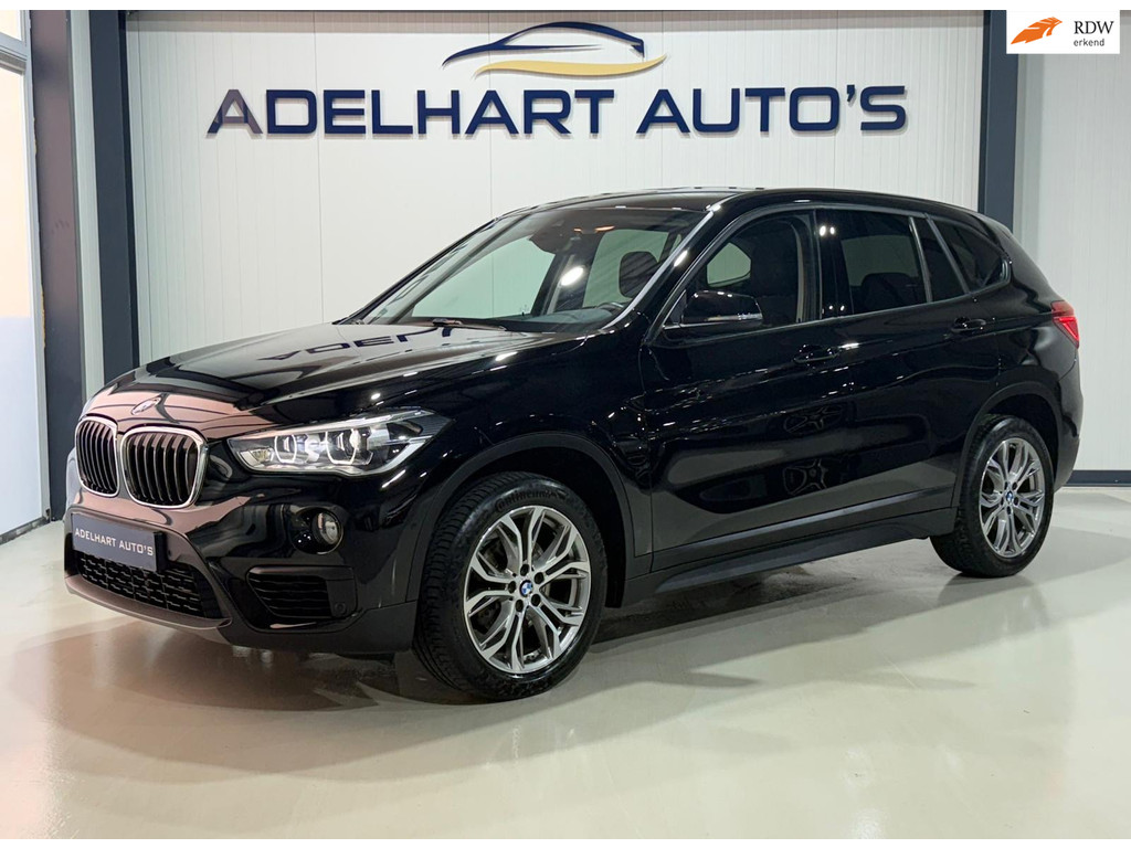 BMW X1 SDrive18i Executive Sport line M Sport Automaat / Navigatie full map / Cruise control / Climate control 51760308-0.jpg | Adelhart Auto's