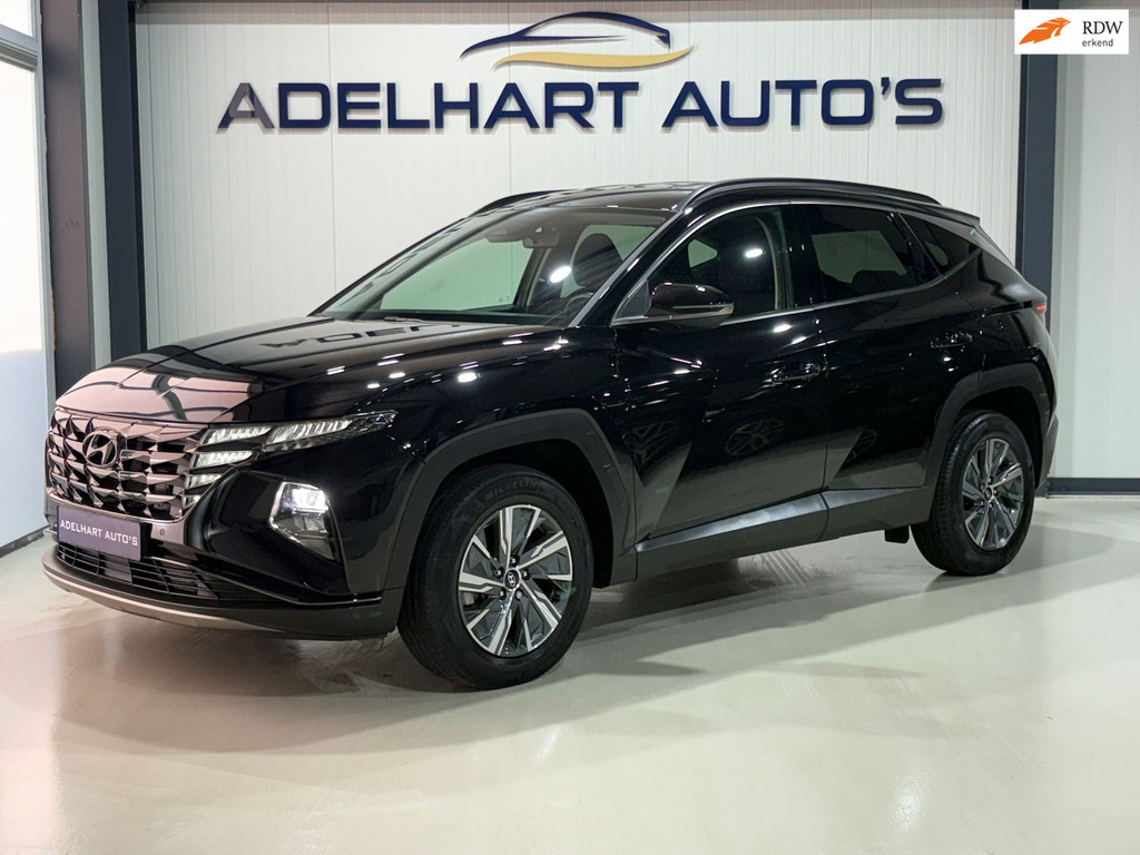 Hyundai Tucson 1.6 T-GDI HEV Comfort 230 PK Automaat / Navigatie full map / Camera / Cruise control etc.. 52218360-0.jpg | Adelhart Auto's