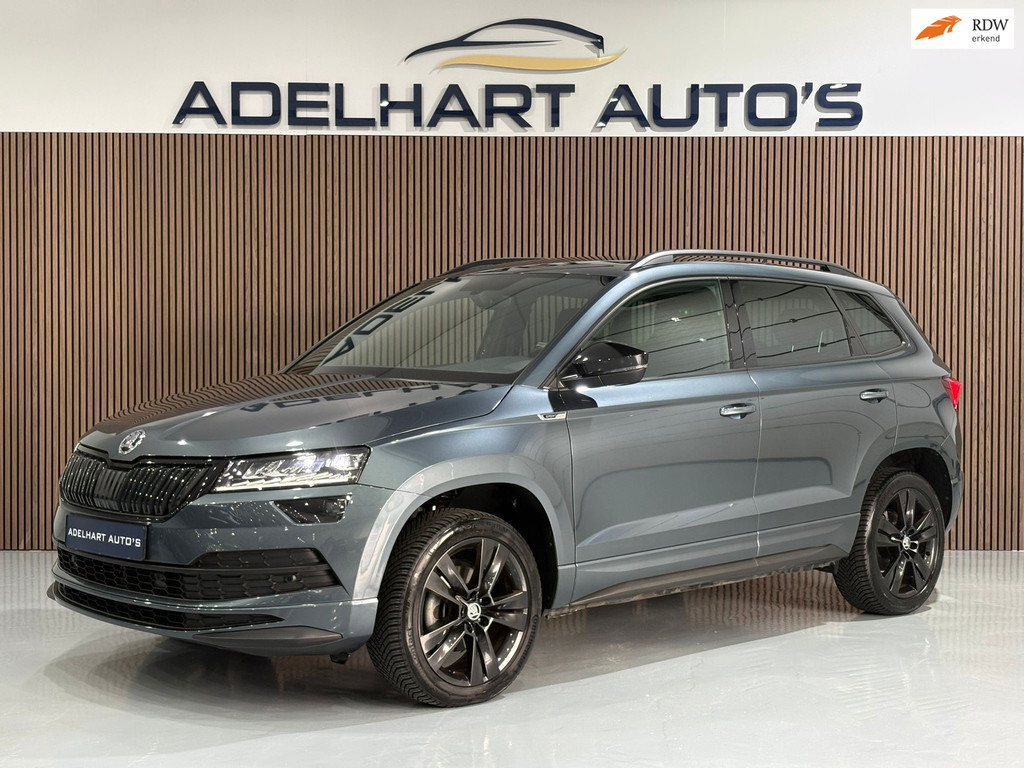 Škoda Karoq 1.5 TSI ACT Sportline Business Automaat DSG / Navigatie full map / Camera / Adaptive Cruise / Climate control 52714476-0.jpg | Adelhart Auto's