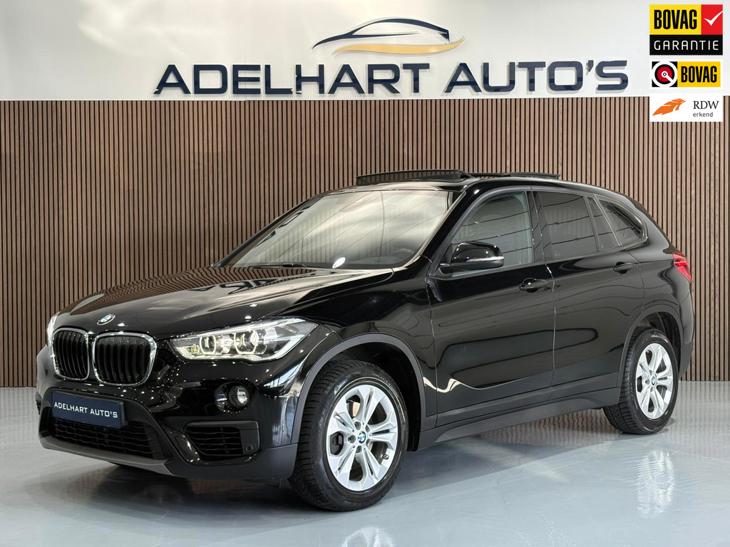 BMW X1 SDrive18i Executive Sportline Automaat / Panorama dak / Navigatie full map / Camera / Cruise control / Climate Control 53104858-0.jpg | Adelhart Auto's
