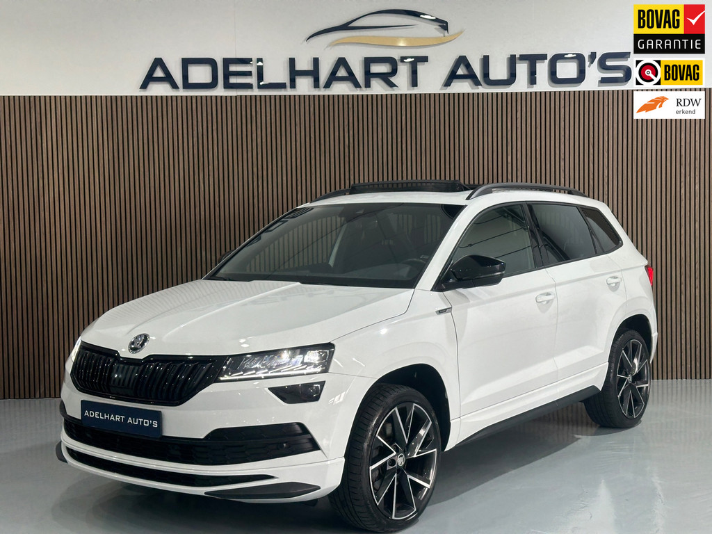 Škoda Karoq 1.5 TSI ACT Sportline Automaat / Panorama dak / Navigatie full map / Canton Sound system 53426623-0.jpg | Adelhart Auto's