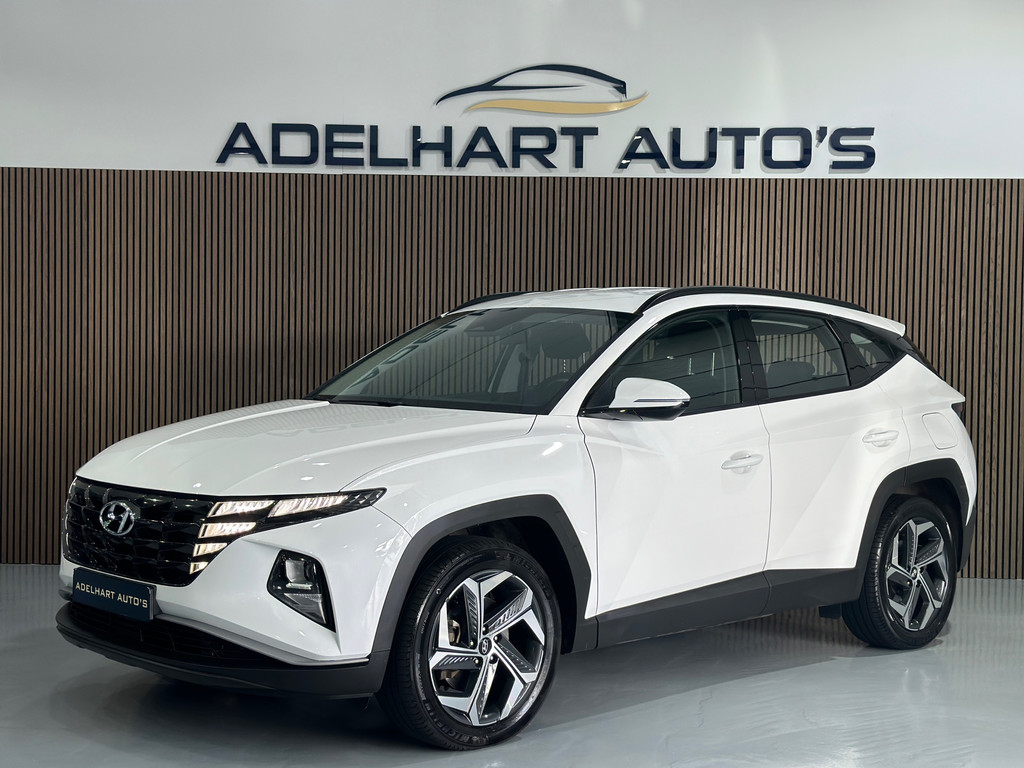 Hyundai Tucson 1.6 T-GDI PHEV Comfort 265 PK Automaat / Navigatie full map / Camera / Cruise control / Climate control / etc.. 54411852-0.jpg | Adelhart Auto's