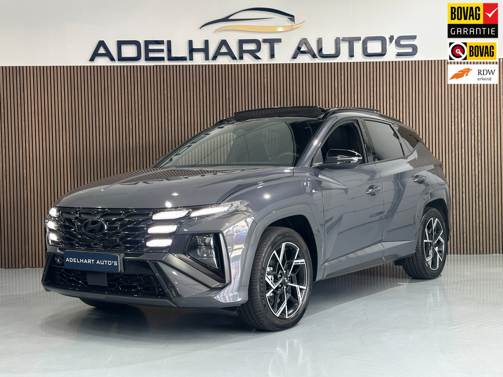 Hyundai Tucson 1.6 T-GDI PHEV N Line Sky 4WD 265 PK Panorama dak / Navigatie full map / Camera / Full option 54448073-0.jpg | Adelhart Auto's