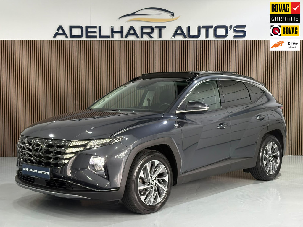 Hyundai Tucson 1.6 T-GDI MHEV Comfort / Panorama dak / Keyless / Cruise control / Climate control 54925900-0.jpg | Adelhart Auto's