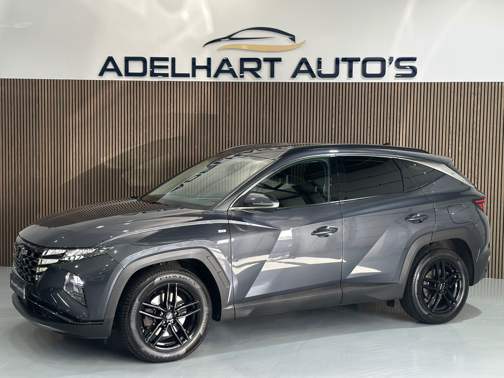 Hyundai Tucson 1.6 T-GDI MHEV Comfort Smart Automaat / Navigatie full map / Camera / Adaptive cruise / Climate control / Keyless 55702569-0.jpg | Adelhart Auto's