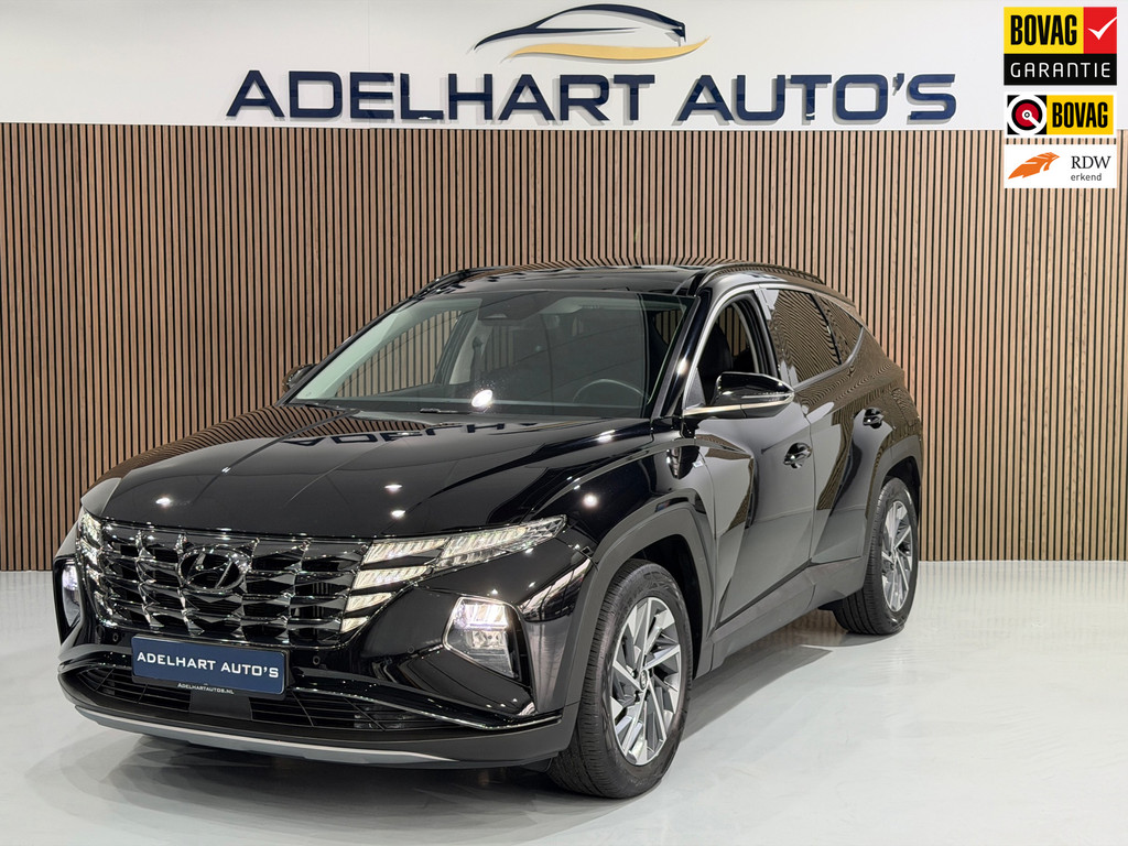 Hyundai Tucson 1.6 T-GDI MHEV Comfort Smart / Panorama dak / Navigatie Full map / Camera / Cruise control 56433423-0.jpg | Adelhart Auto's