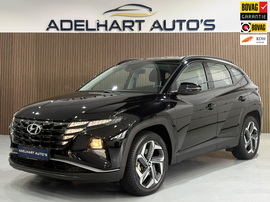 Hyundai Tucson 1.6 T-GDI PHEV Comfort 4WD 265 PK / Navigatie full map / Camera / Cruise control / Climate control 56600812-0.jpg | Adelhart Auto's