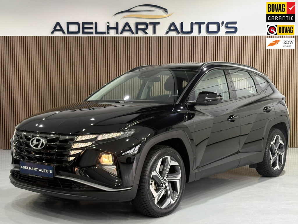 Hyundai Tucson 1.6 T-GDI PHEV Comfort 4WD 265 PK / Navigatie full map / Camera / Cruise control / Climate control 56600812-0.jpg | Adelhart Auto's