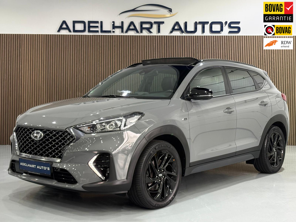 Hyundai Tucson 1.6 T-GDI N-Line Nardo Grey 177 PK automaat Panoramadak / Navigatie full map / Camera / Cruise control / Climate 56630483-0.jpg | Adelhart Auto's