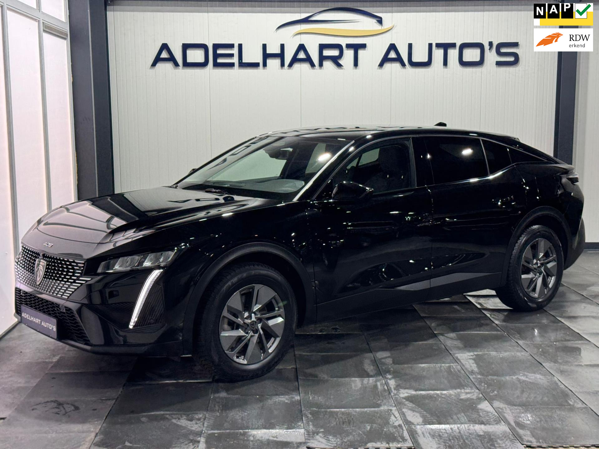 Peugeot 408 1.6 HYbrid Allure 180 EAT8 / Navigatie full map / 360 Camera / Lederen interieur / keyless / etc.. 46933843-0.jpg | Adelhart Auto's