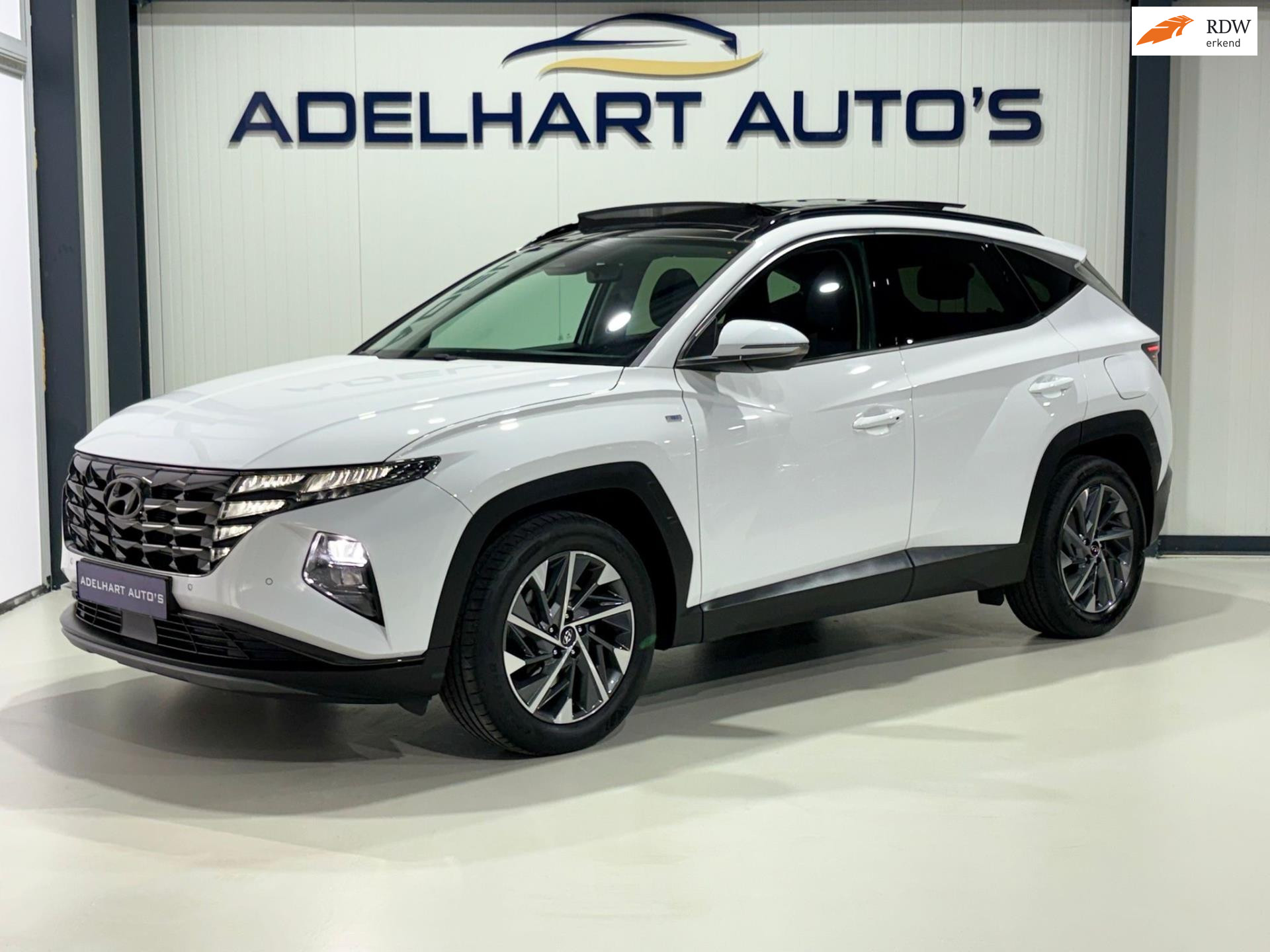 Hyundai Tucson 1.6 T-GDI MHEV Comfort Smart Automaat / Panorama dak / Navigatie full map / Camera / Cruise control 49938910-0.jpg | Adelhart Auto's