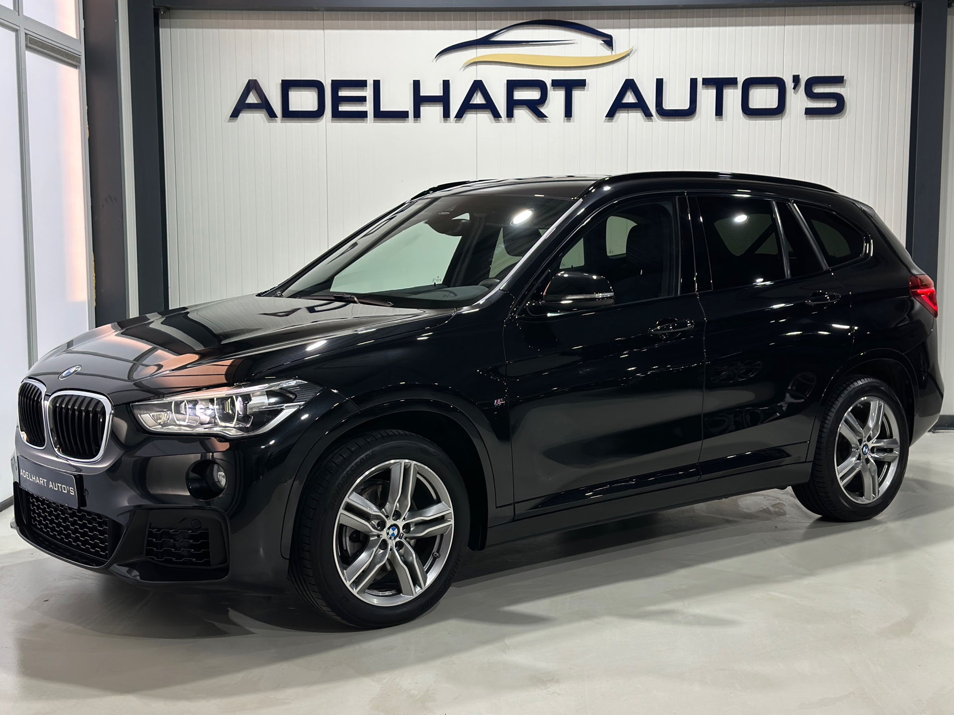 BMW X1 SDrive18i Executive M Sport Automaat / Navigatie full map / Cruise control / Climate control 50217679-0.jpg | Adelhart Auto's